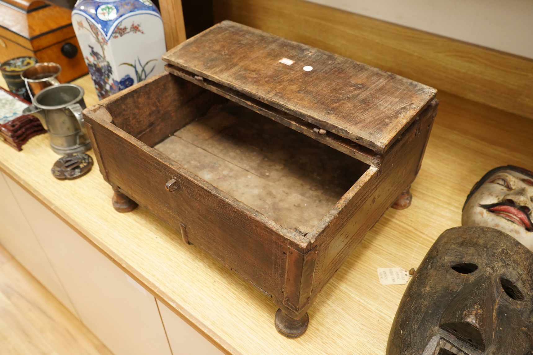An Indian table top dowry chest with chip-carved and incised detail, 39cm wide